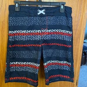 Boys swim trunks.  Cherokee brand.  Size Large (12-14).  Good used condition